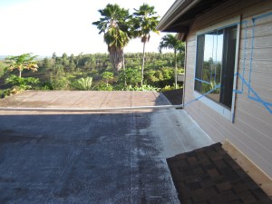 Cheap leaky roof with bad connections to the back of the master bedroom. Water ponded on this roof and leaked into the kitchen ceiling drywall. The blue tape on the wall shows how the new roof will intersect the old wall, which means we need to install new windows.