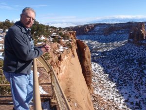Image from Dec 2009 of blogger's Dad standing at the visitor center, looking down a canyon. | MilitaryFinancialIndependence.com