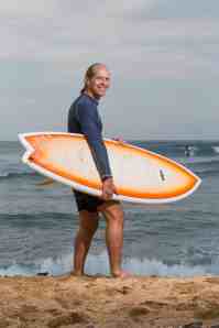 Photo of Doug Nordman at a surfing beach for USAA Magazine | The-Military-Guide.com