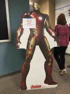 Image of cardboard cutout lifesize replica of the Marvel comic-book character Iron Man with USAA caption "Have you sparkled today?" | The-Military-Guide.com