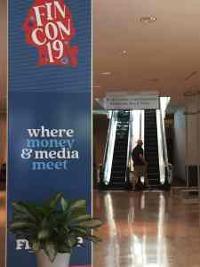 Image of the FinCon19 logo and slogan "Where Money And Media Meet". | The-Military-Guide.com