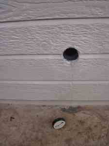 Unscrew the plug to see inside the drain piping. Now you can work on the drain piping without being in the kitchen or under the sink.