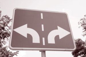 Image of a road sign with two directions | The-Military-Guide.com