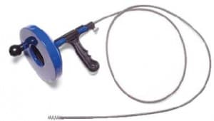 Insert the pointy end into the drain pipe and push it down the drain. As you turn the handle, you'll spin the snake in the pipe to clear out the clog.