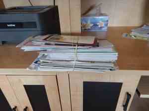 Image of pile of mail held for three months of a trip to Spain | The-Military-Guide.com