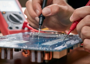 Image of sample tools from Navy Microminiature Repair course (2M) troubleshooting the backplane of a circuit board | MilitaryFinancialIndependence.com