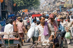 Image of a huge crowd of older people working in the streets of India | MilitaryFinancialIndependence.com