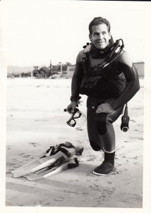 1988 photo of Doug Nordman at a beach in Monterey CA, wearing full SCUBA gear (including a 5mm neoprene wetsuit) for a Rescue Diver course. | MilitaryFinancialIndependence.com