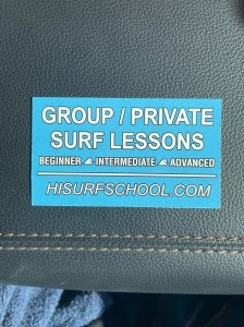 Image of business card of Hawaii Waves Surf School with "Feel The Wave" tagline and "Ask For Ash!" instructor phone number 808-256-7226. Group or private lessons at all skill levels. | MilitaryFinancialIndependence.com