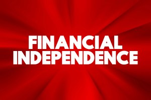 Image of a draft book cover for "Living Your Financial Independence" with red splash background and the words "Financial Independence." | MilitaryFinancialIndependence.com